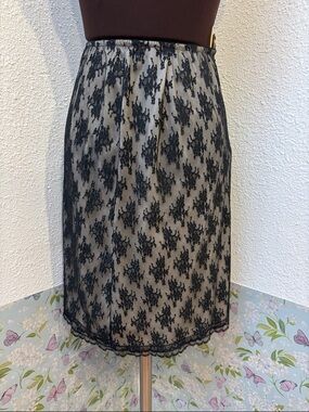 Vintage 1970’s Vanity Fair black floral mesh lace pencil slip skirt. Size S.